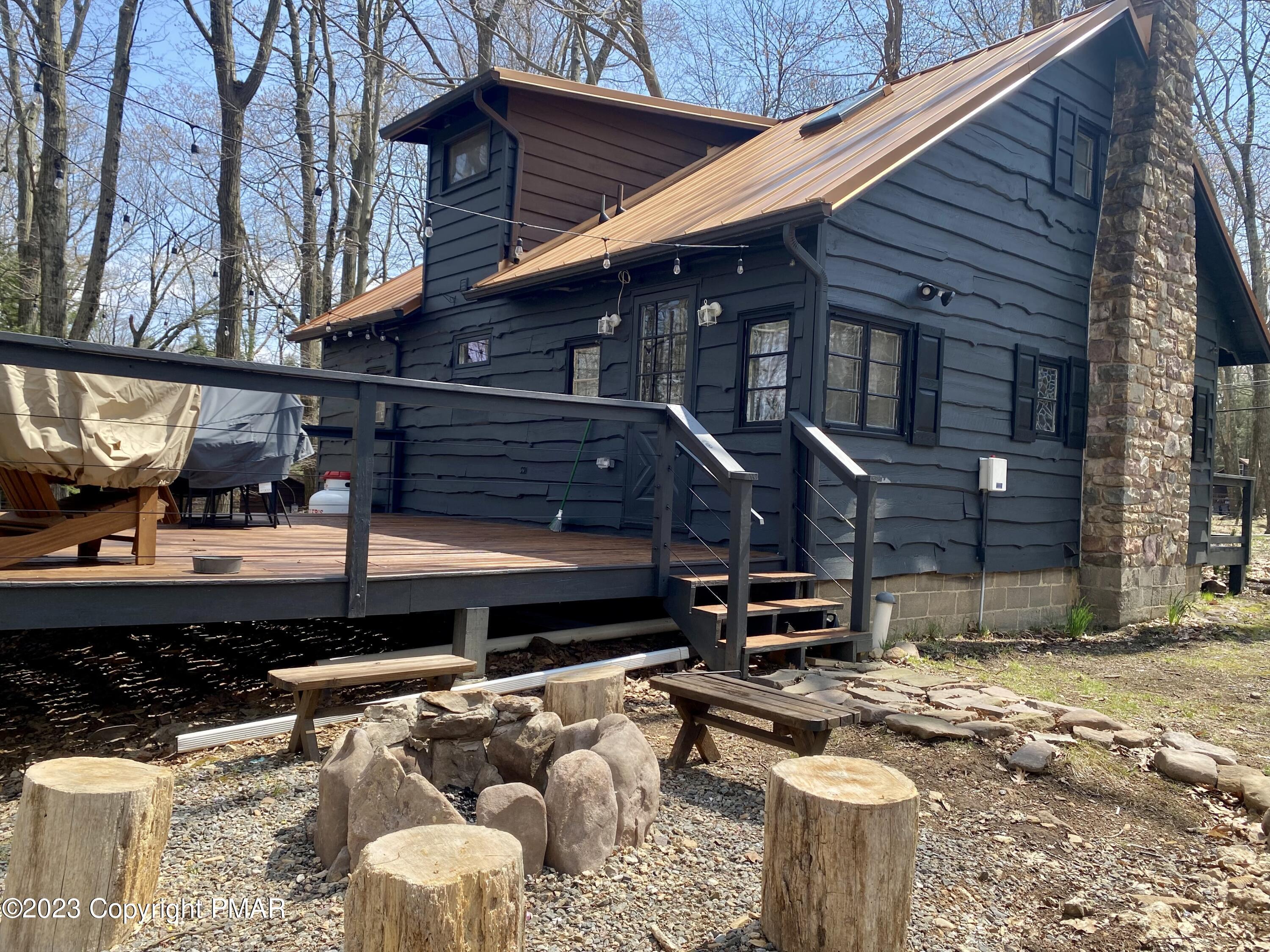 24 Split Rock Road Lake Harmony, PA 18624 - Photo 26 of 42 a view of a house with a patio