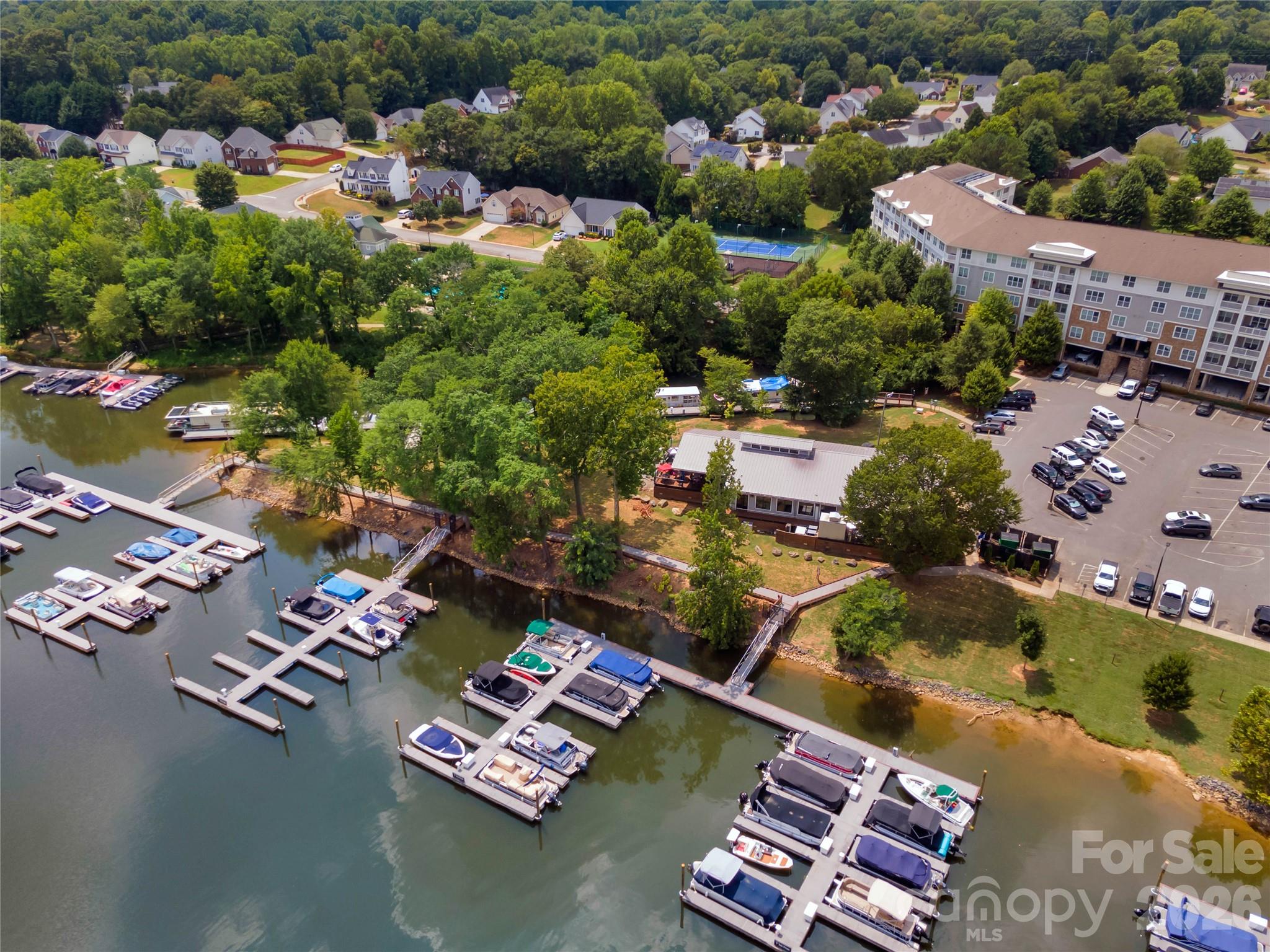 152 Lighthouse Road Mount Holly, NC 28120 - Photo 4 of 11 an aerial view of residential houses with outdoor space