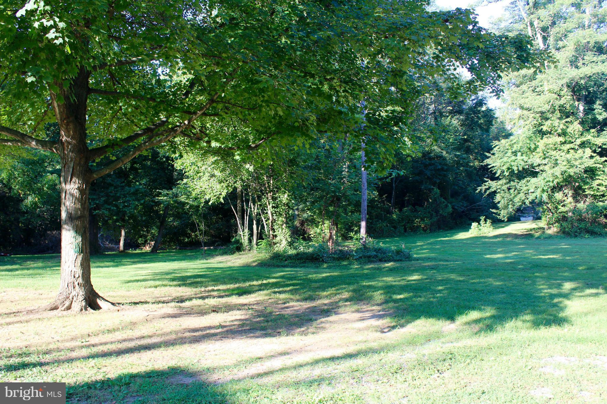 3650 Golf Course Road Martinsburg, WV 25405 - Photo 4 of 16 a view of a backyard with green space