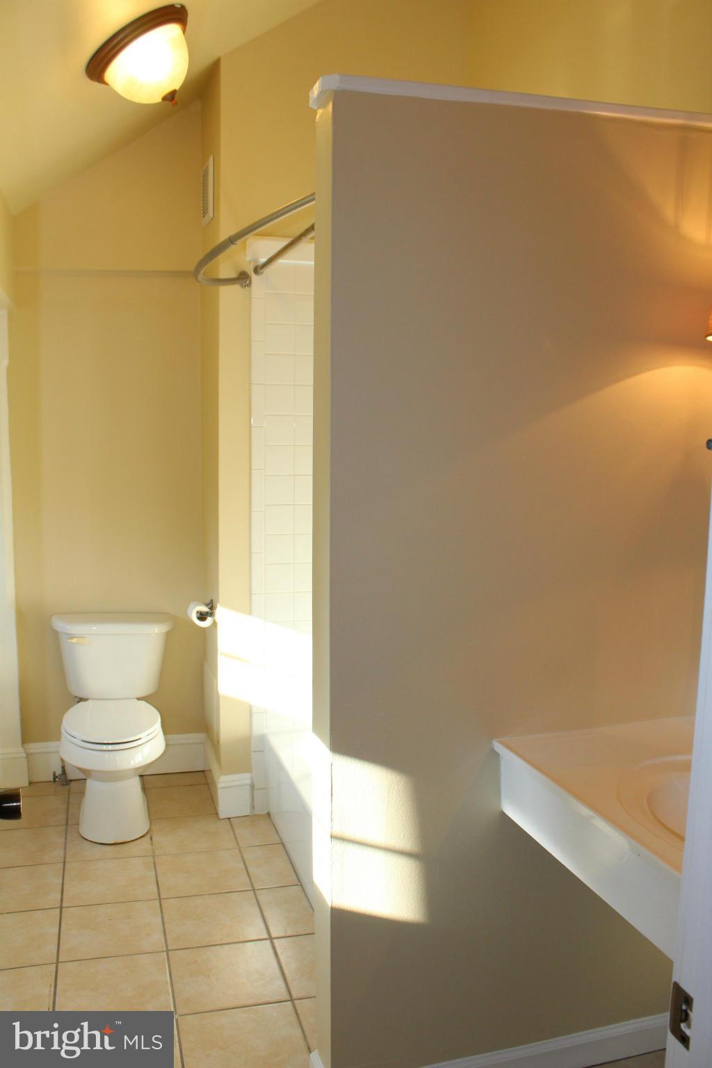 3650 Golf Course Road Martinsburg, WV 25405 - Photo 10 of 16 a bathroom with a toilet and a shower