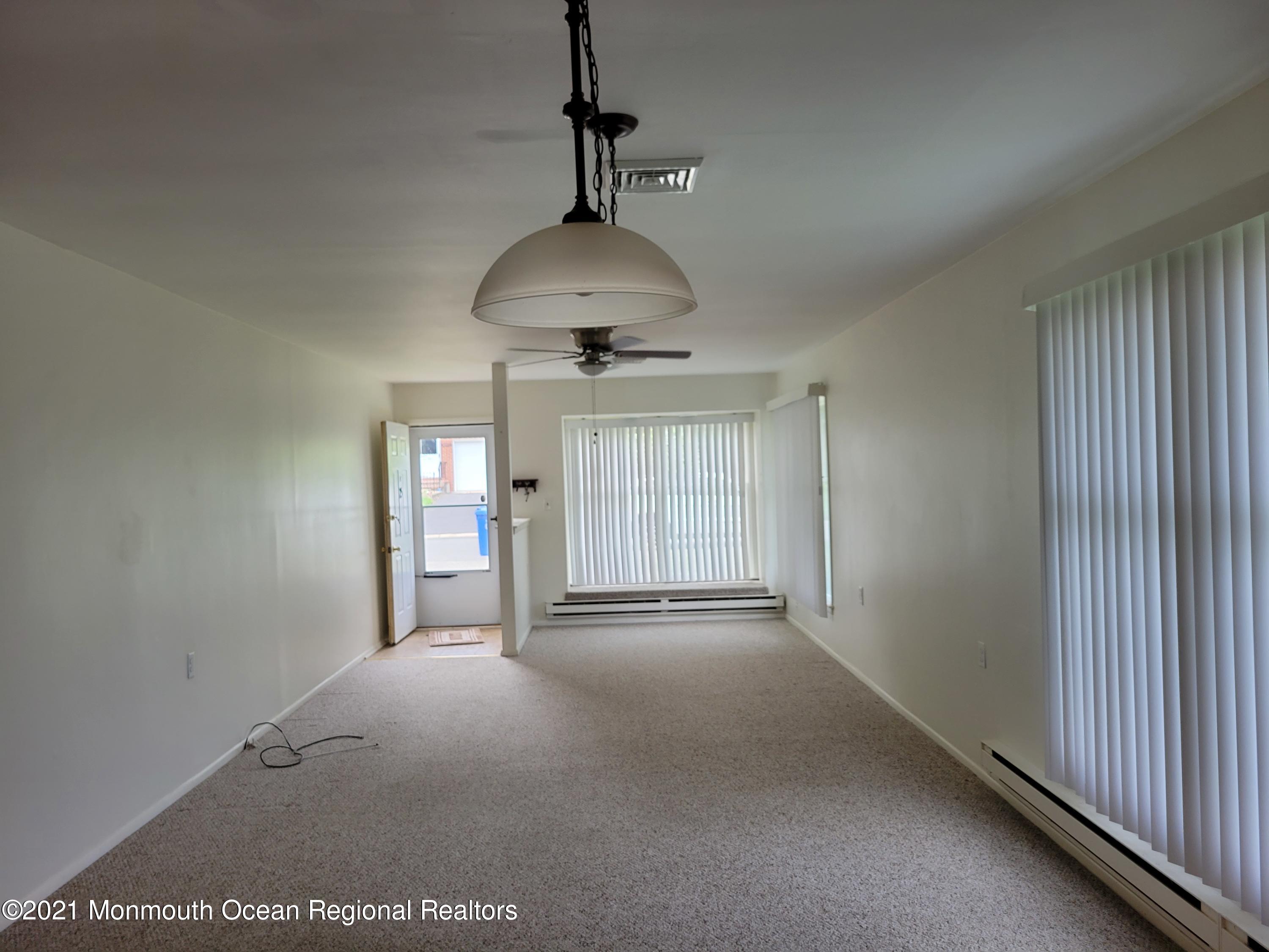 25 Magnolia Road, Unit 13 Manahawkin, NJ 08050 - Photo 2 of 13 Living dining 1