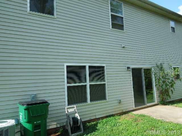15509 Rathangan Drive Charlotte, NC 28273 - Photo 2 of 13 a view of backyard with a chair