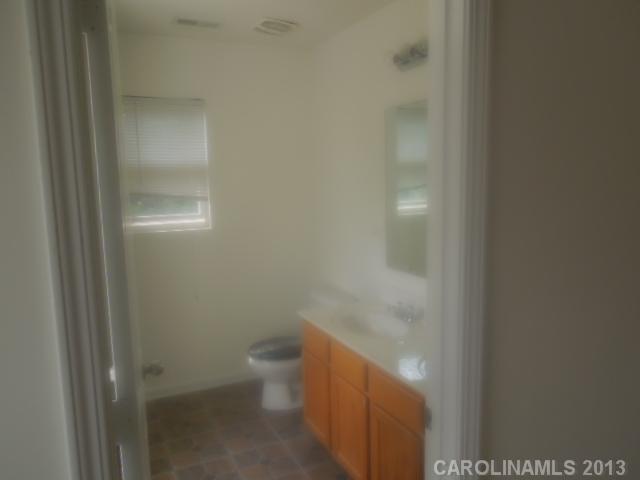 15509 Rathangan Drive Charlotte, NC 28273 - Photo 13 of 13 a bathroom with a toilet