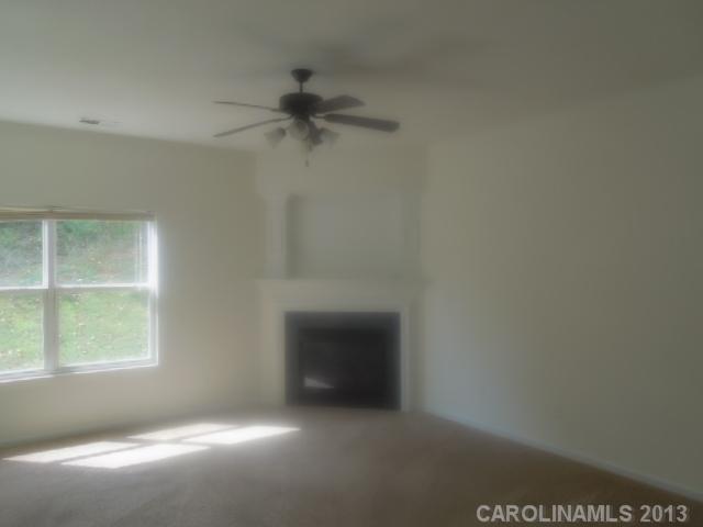 15509 Rathangan Drive Charlotte, NC 28273 - Photo 5 of 13 an empty room with a window