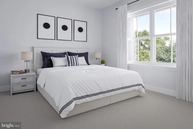 a bed room with a bed and a night stand