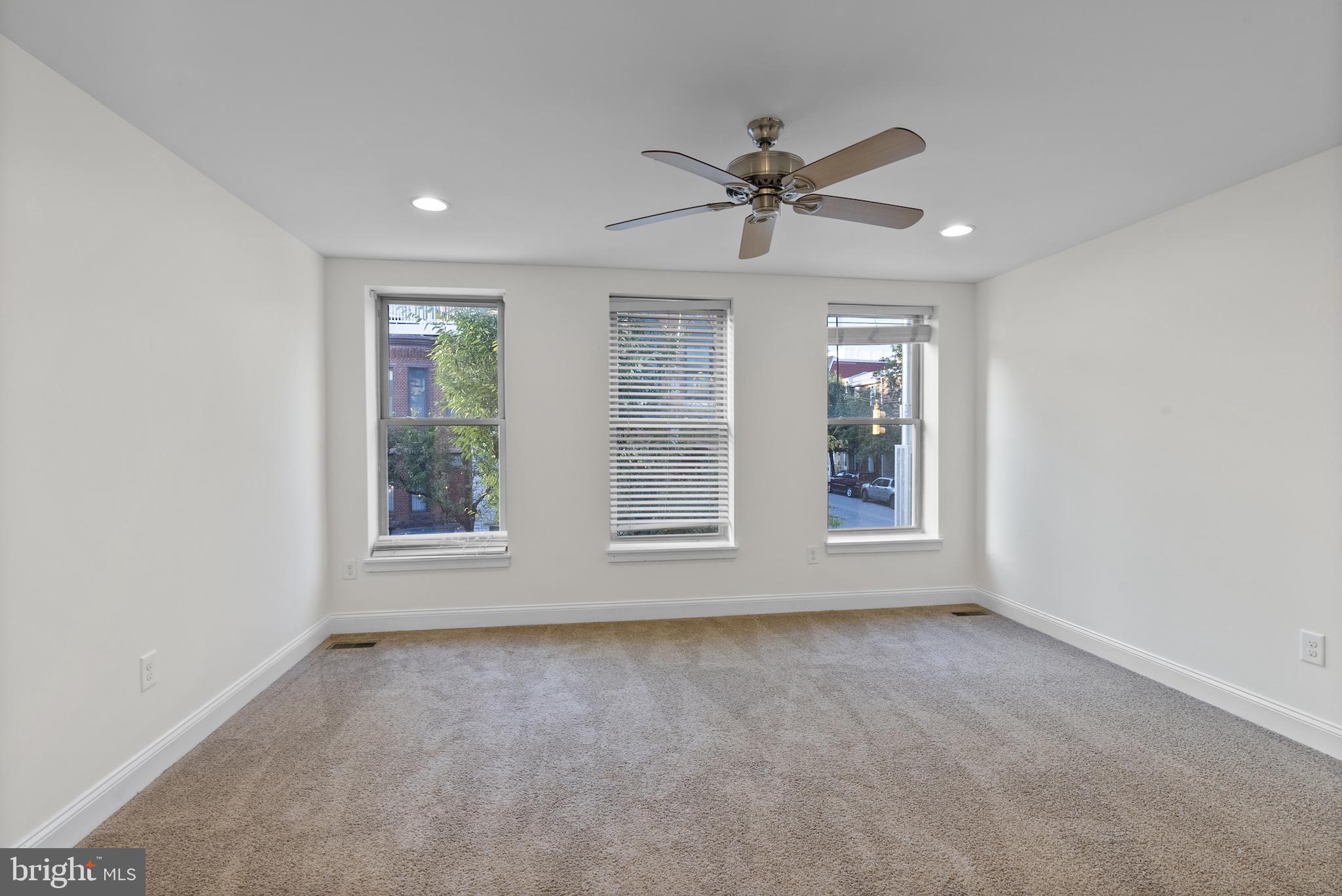 402 East Fort Avenue Baltimore, MD 21230 - Photo 14 of 35 a view of an empty room with a window