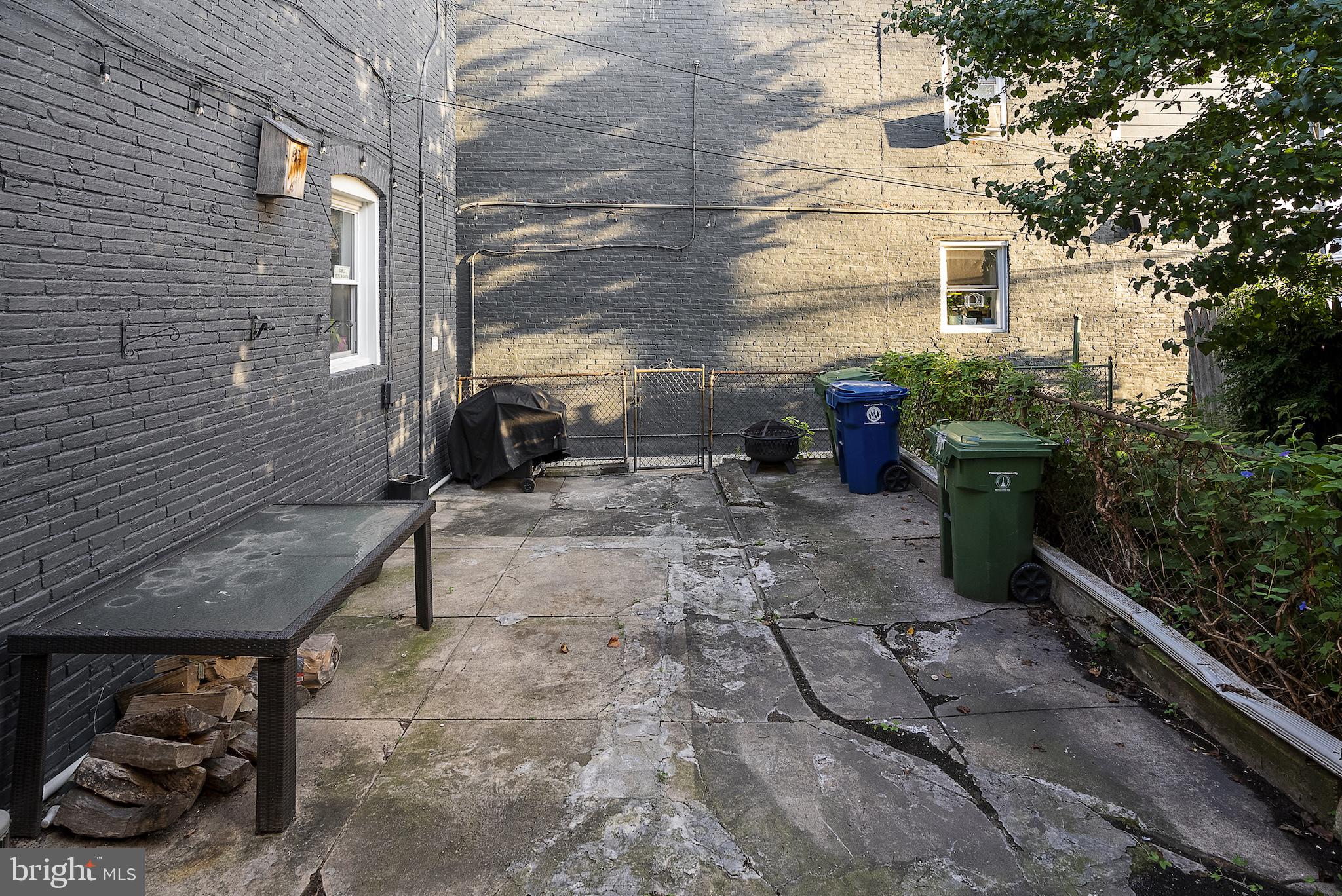 402 East Fort Avenue Baltimore, MD 21230 - Photo 31 of 35 a view of a backyard with sitting area and furniture