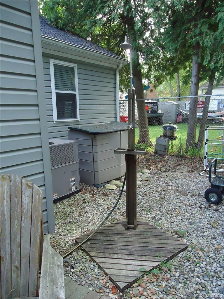 7383 Laurel Road Lexington, MI 48450 - Photo 11 of 15 House Back.jpg