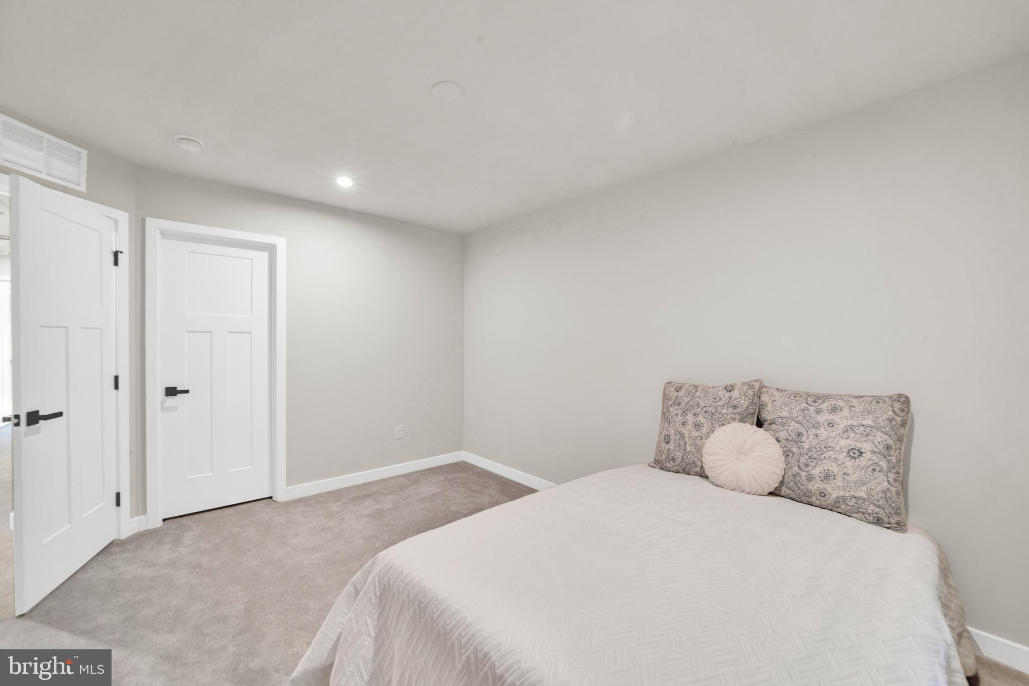 15 Pratt Lane Lawrence Township, NJ 08648 - Photo 23 of 31 a bedroom with a bed and a window