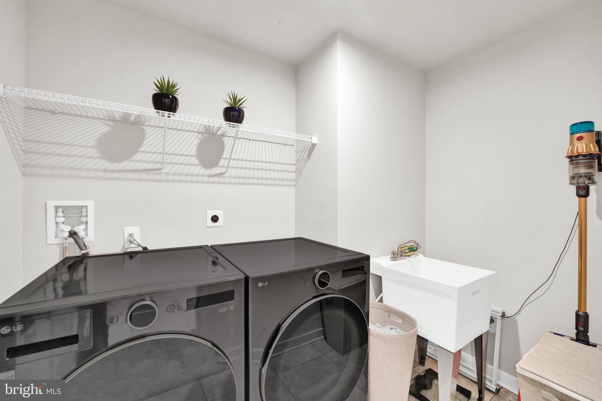 15 Pratt Lane Lawrence Township, NJ 08648 - Photo 24 of 31 a utility room with dryer and washer