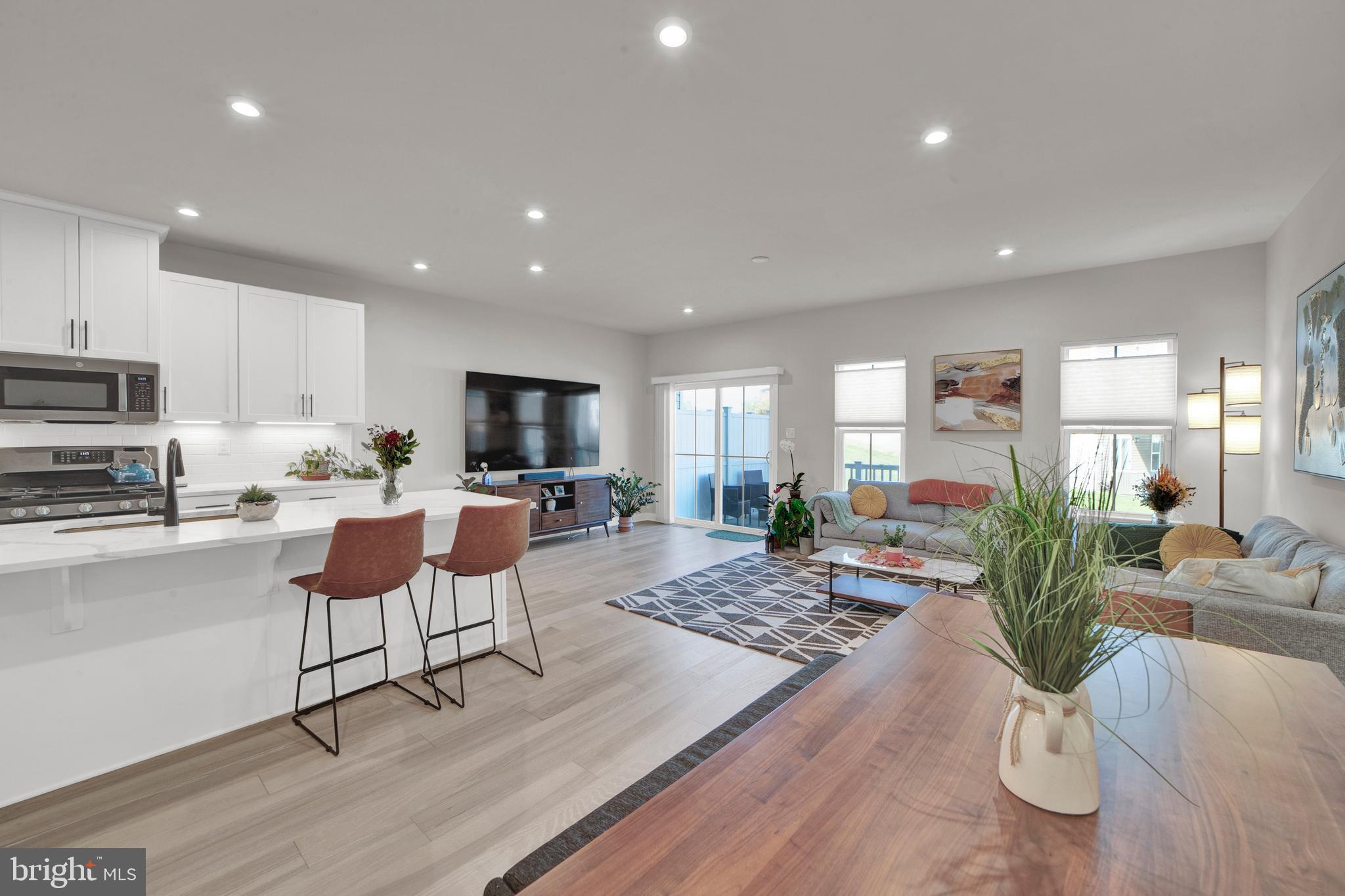 15 Pratt Lane Lawrence Township, NJ 08648 - Photo 4 of 31 a living room with furniture and a wooden floor