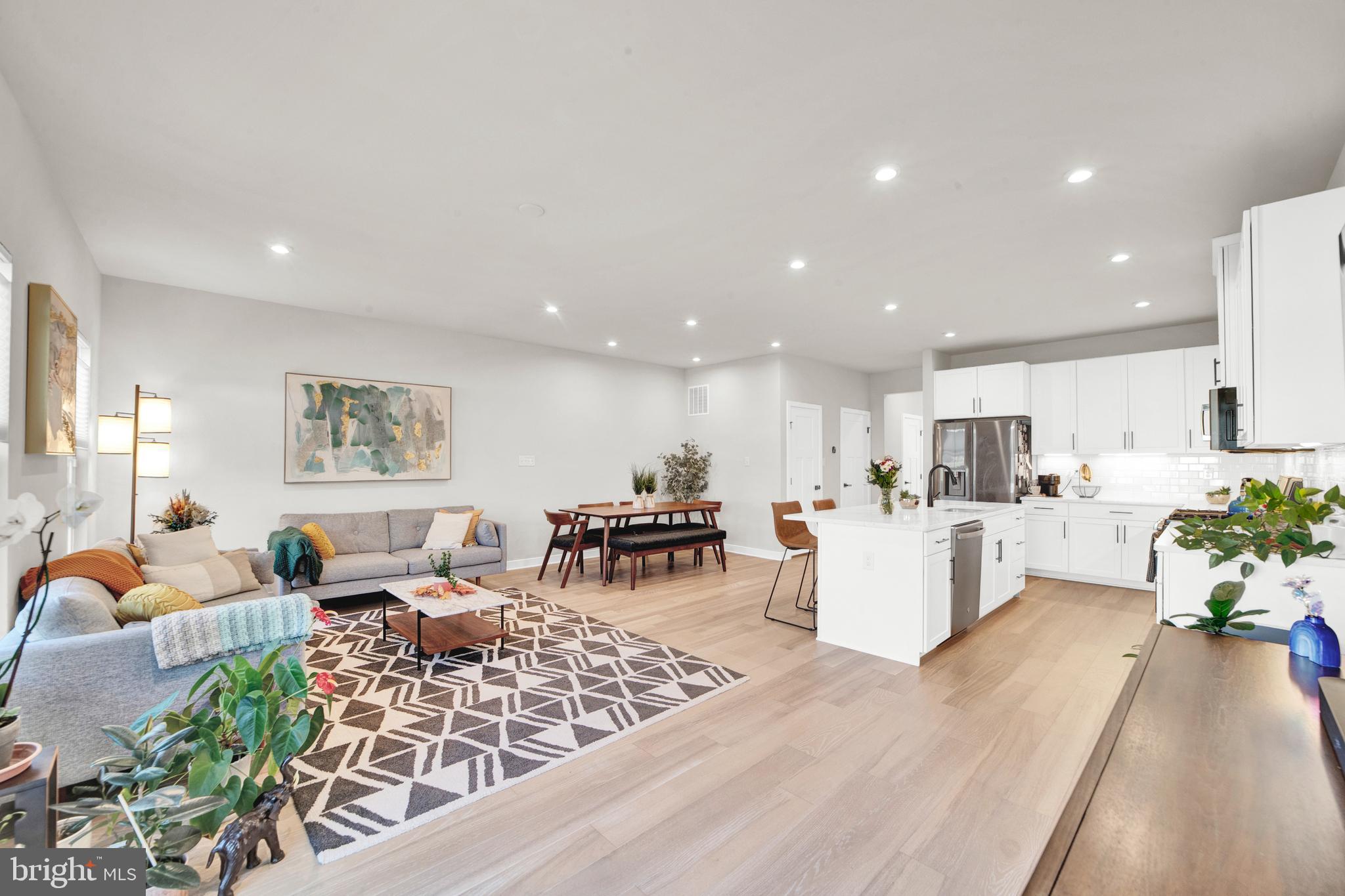15 Pratt Lane Lawrence Township, NJ 08648 - Photo 5 of 31 a living room with furniture and a large window