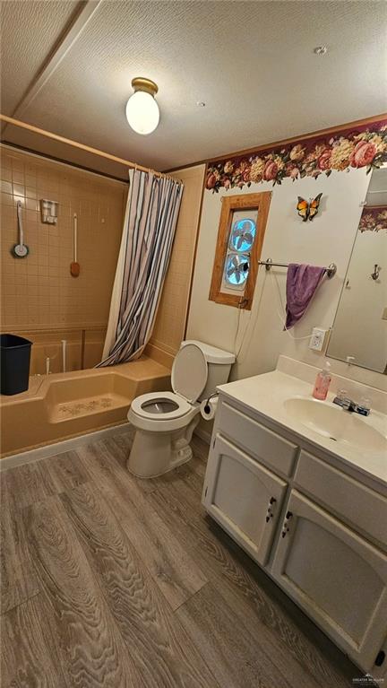 1905 Johnson Street Mission, TX 78572 - Photo 11 of 22 a bathroom with a sink mirror vanity and toilet
