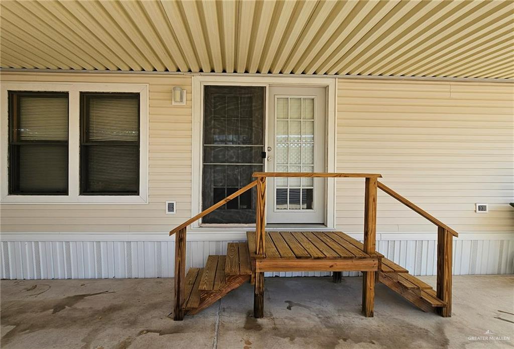 1905 Johnson Street Mission, TX 78572 - Photo 3 of 22 a view of a house with wooden stairs and a stairs