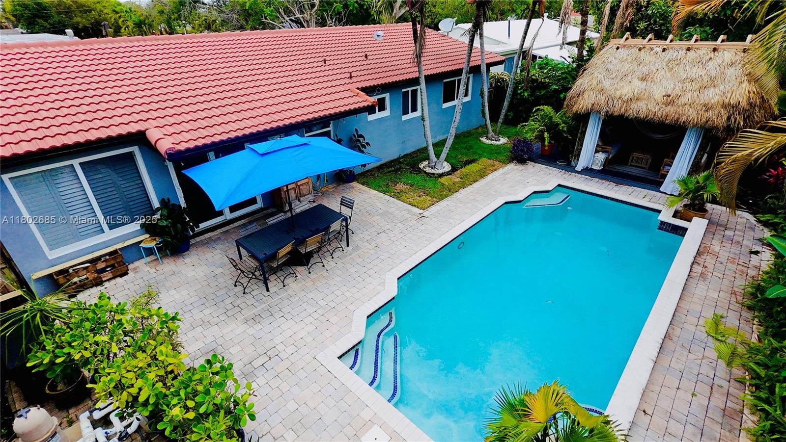 a backyard of a house with seating space