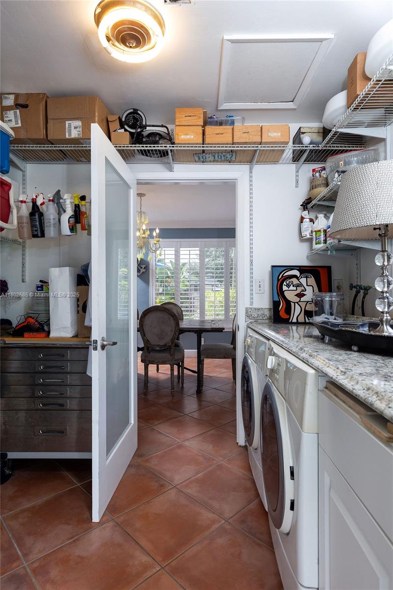 3192 Coolidge Street Hollywood, FL 33021 - Photo 14 of 34 a kitchen with stainless steel appliances granite countertop a sink and a stove