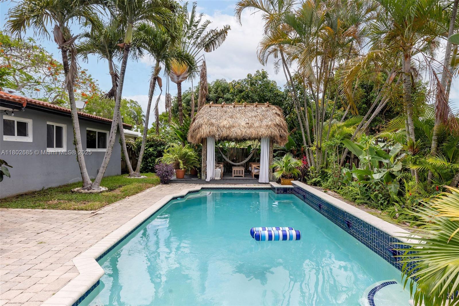 3192 Coolidge Street Hollywood, FL 33021 - Photo 17 of 34 a view of swimming pool with a lounge chairs