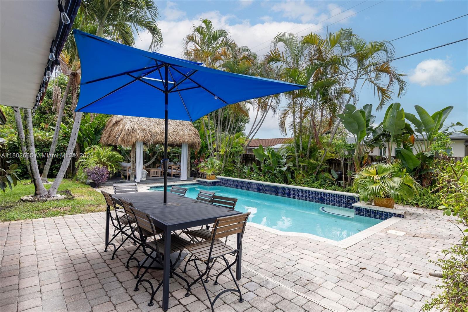 3192 Coolidge Street Hollywood, FL 33021 - Photo 21 of 34 a view of swimming pool with outdoor seating