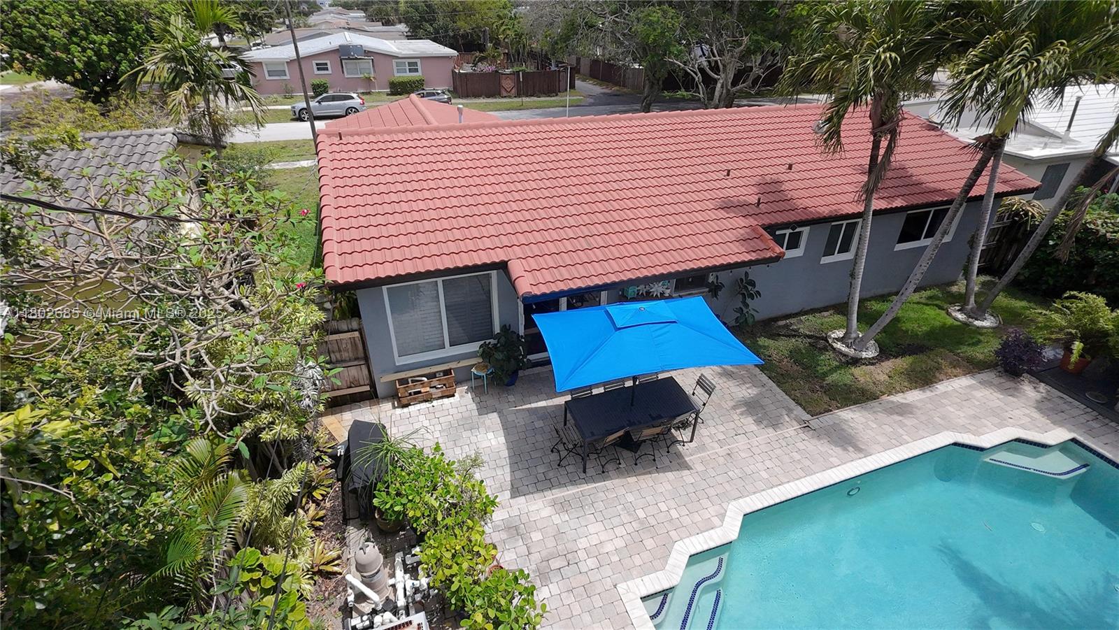 3192 Coolidge Street Hollywood, FL 33021 - Photo 27 of 34 a front view of a house with garden