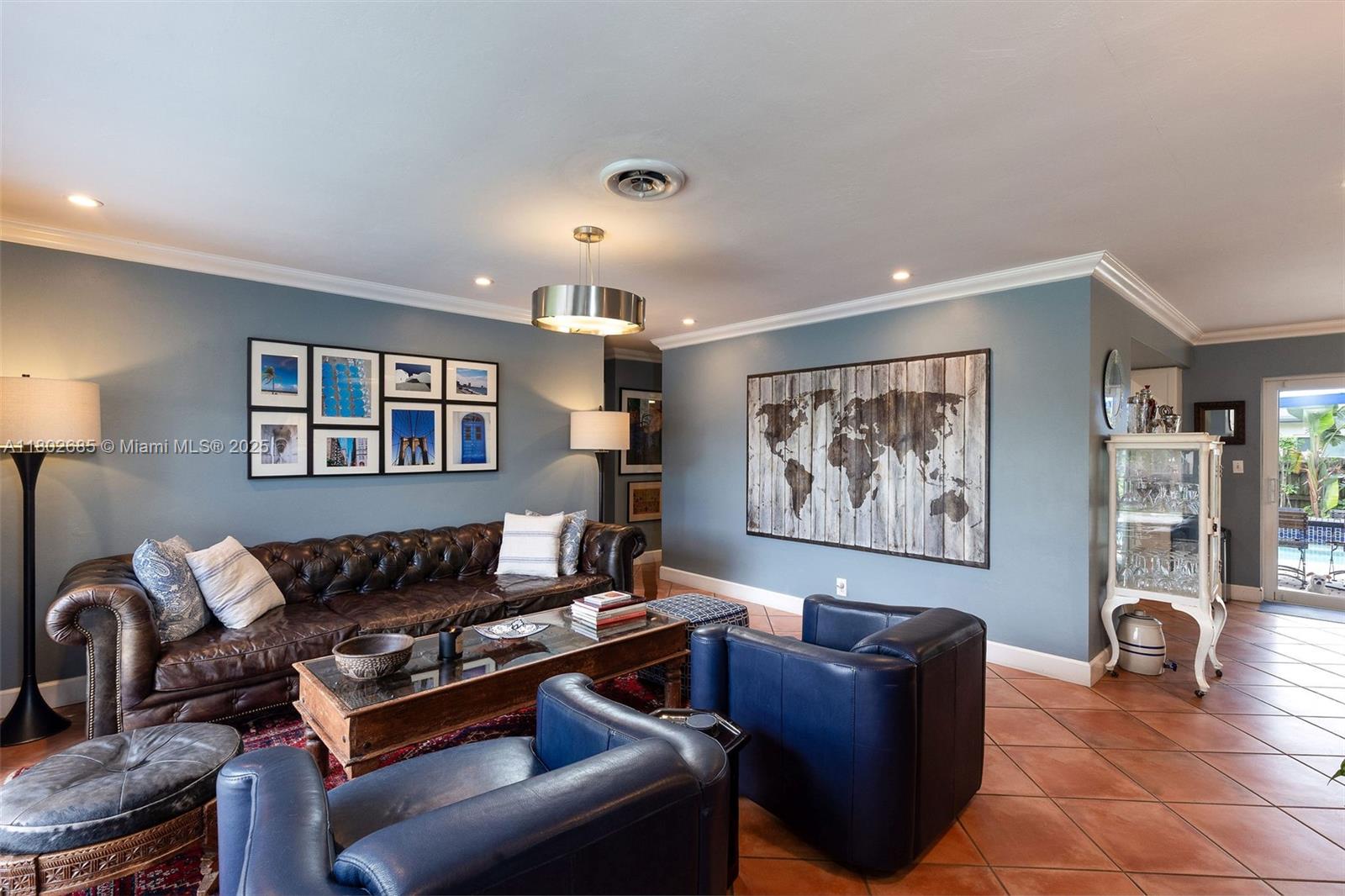 3192 Coolidge Street Hollywood, FL 33021 - Photo 3 of 34 a living room with furniture and a window