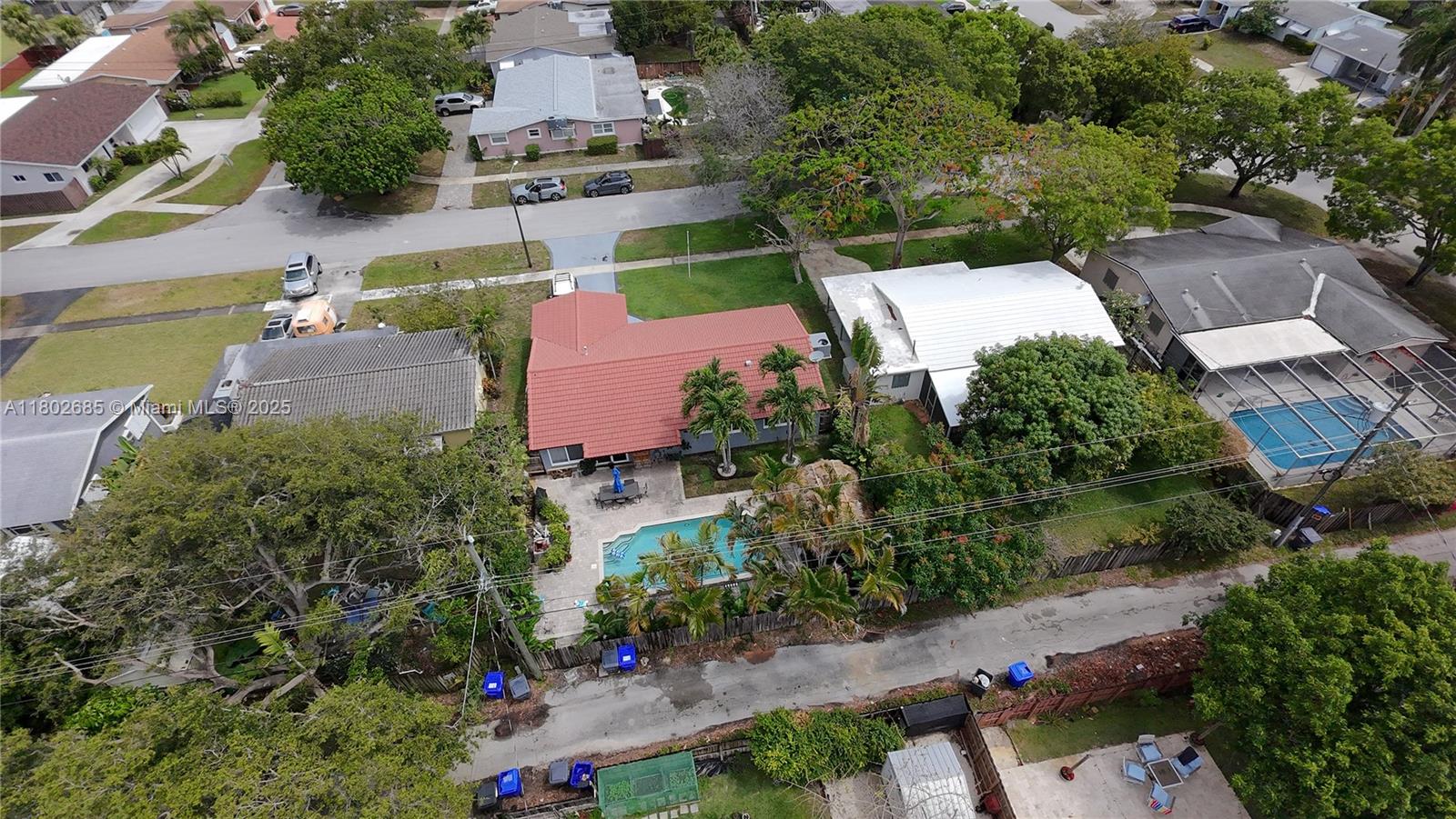 3192 Coolidge Street Hollywood, FL 33021 - Photo 32 of 34 an aerial view of a house with a garden