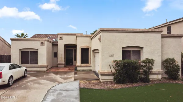 a front view of a house with a porch