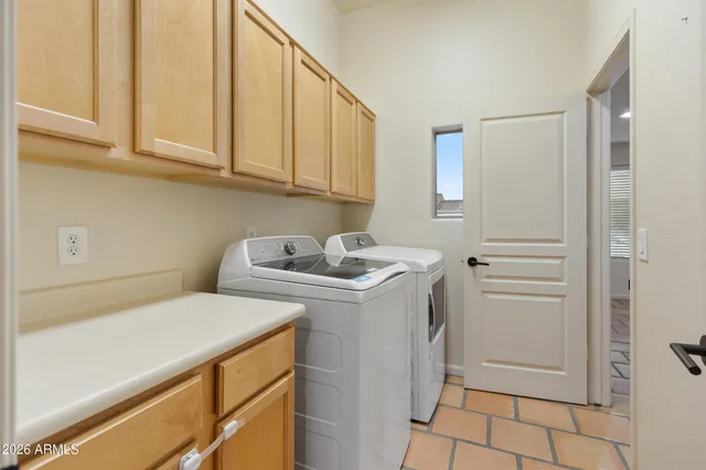 a view of a workspace with furniture