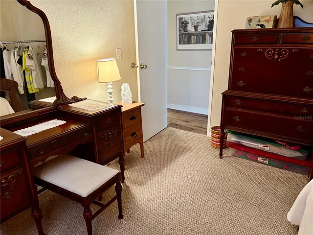 a view of a hallway with workspace