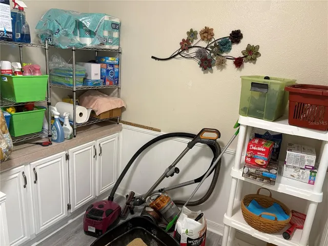 a room with toys and a wooden floor