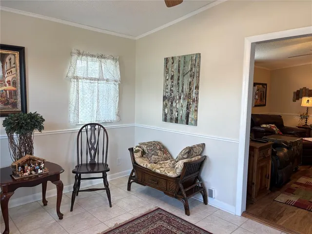 a living room with furniture and windows