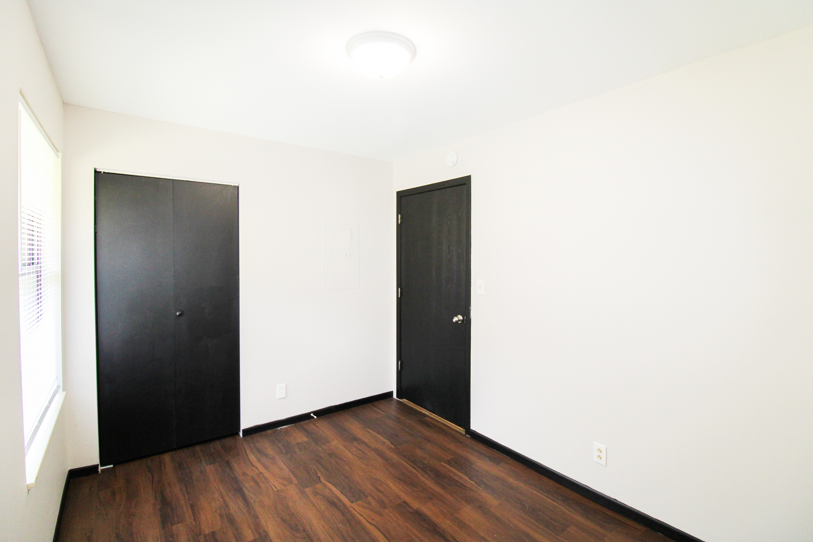 2008 Vawter Street, Unit 201 Urbana, IL 61801 - Photo 11 of 19 a view of an empty room with wooden floor