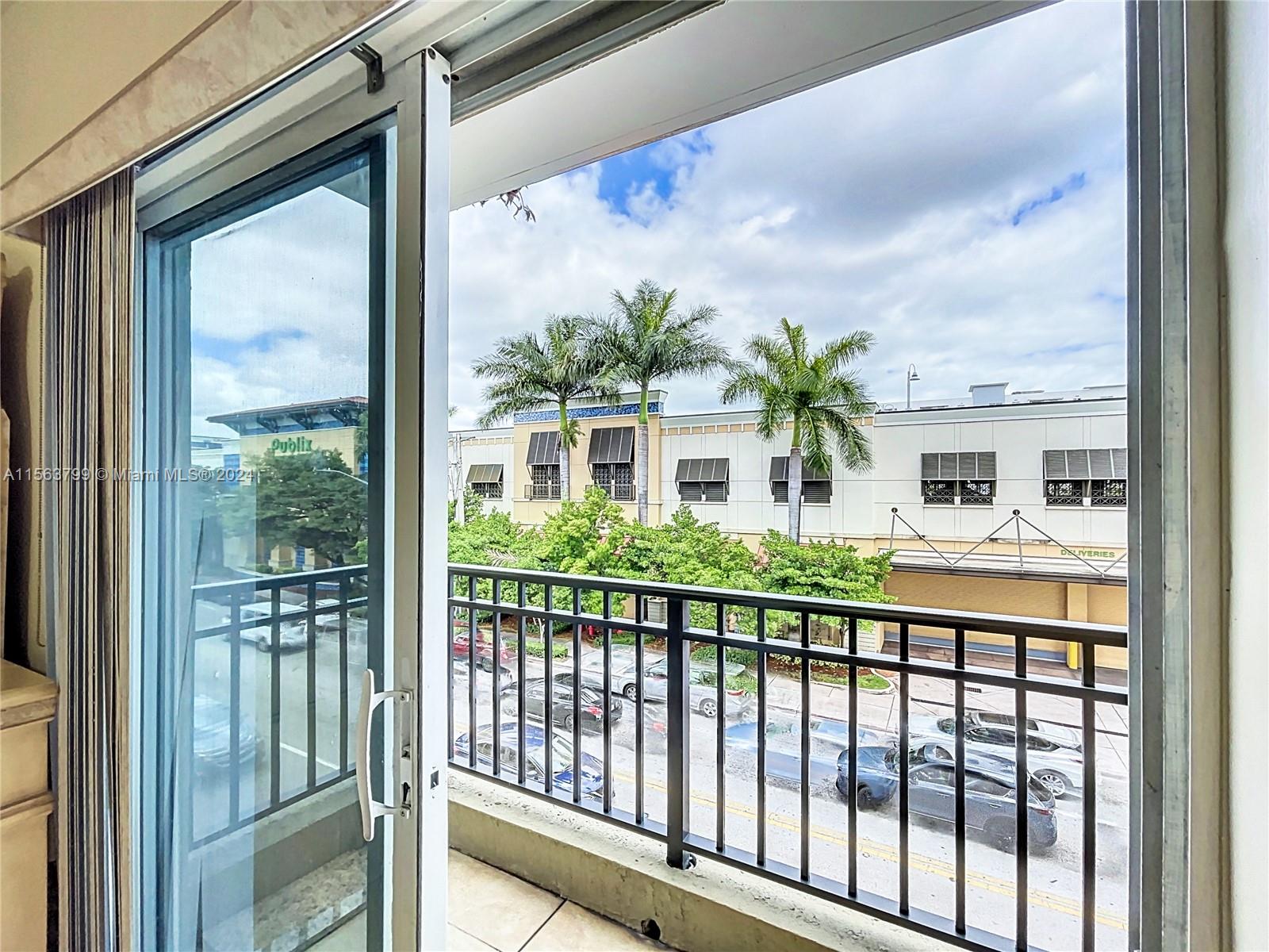 120 South Douglas Road, Unit 302 Miami, FL 33134 - Photo 18 of 28 a front view of a house with a balcony