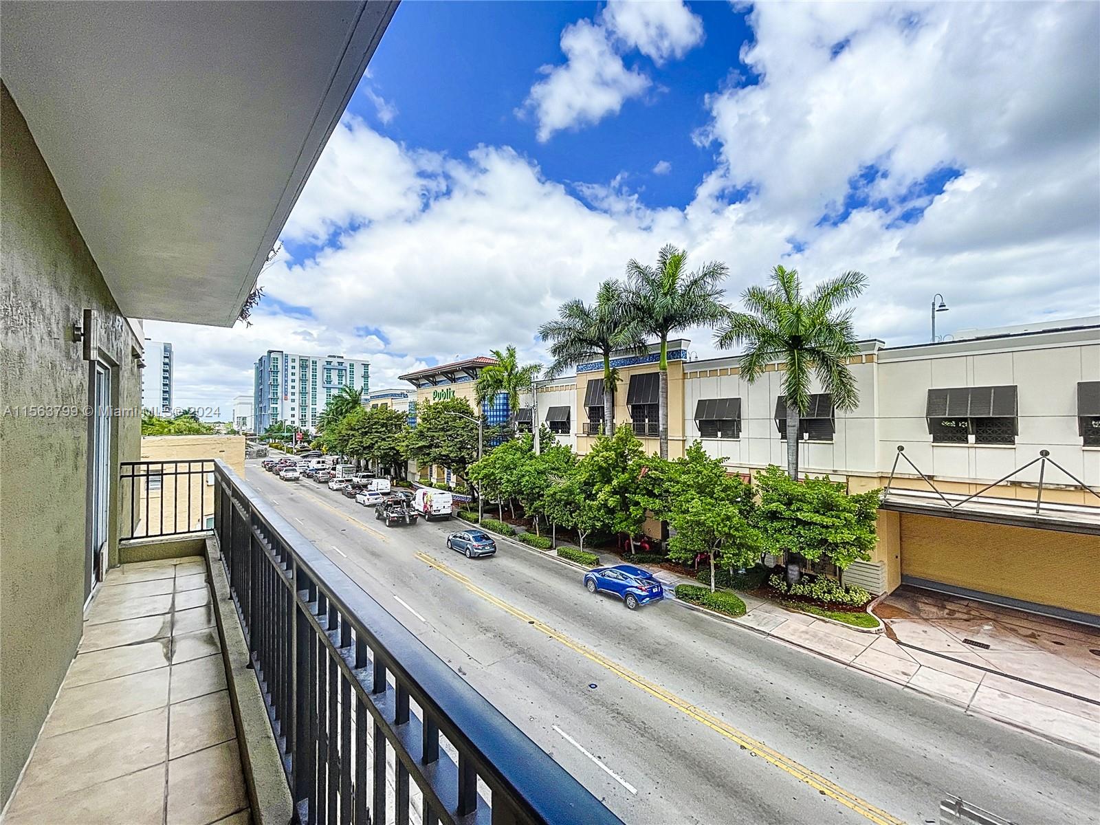 120 South Douglas Road, Unit 302 Miami, FL 33134 - Photo 21 of 28 a view of a house with a garden and pathway