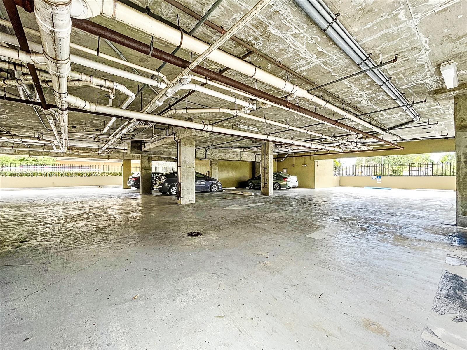 120 South Douglas Road, Unit 302 Miami, FL 33134 - Photo 25 of 28 a view of a room with wooden roof