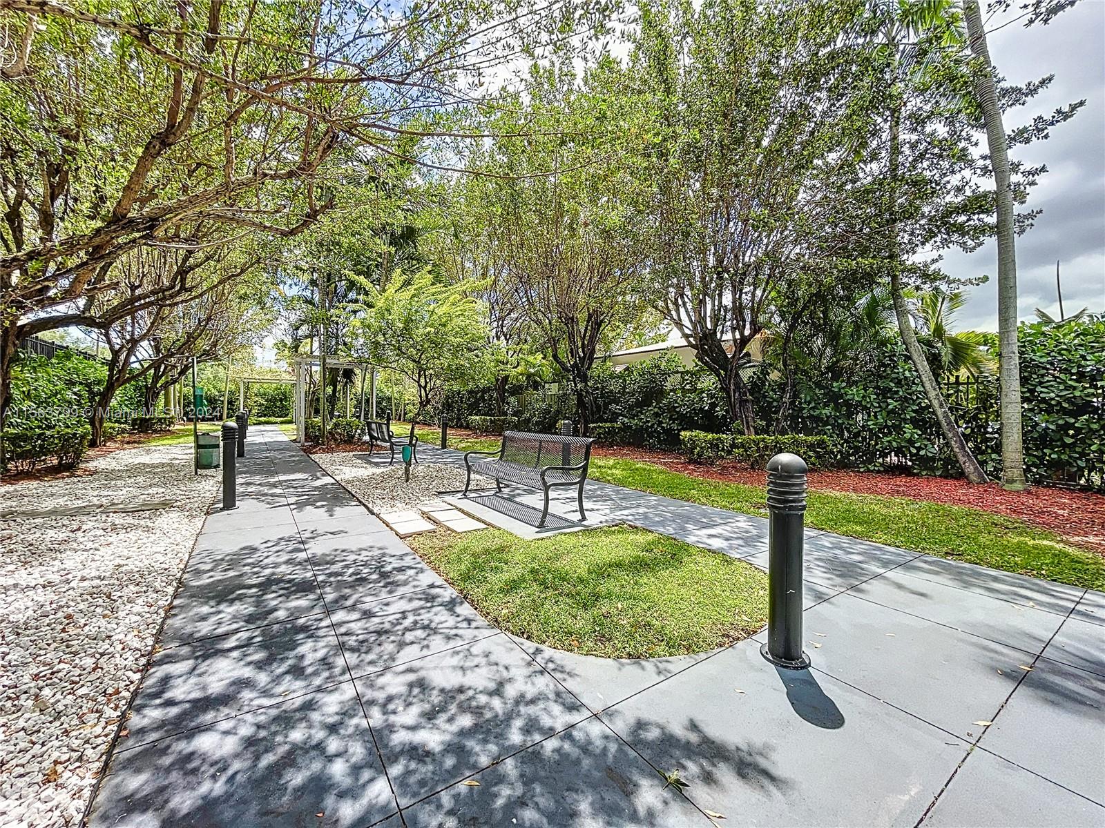 120 South Douglas Road, Unit 302 Miami, FL 33134 - Photo 26 of 28 a view of a park with large trees