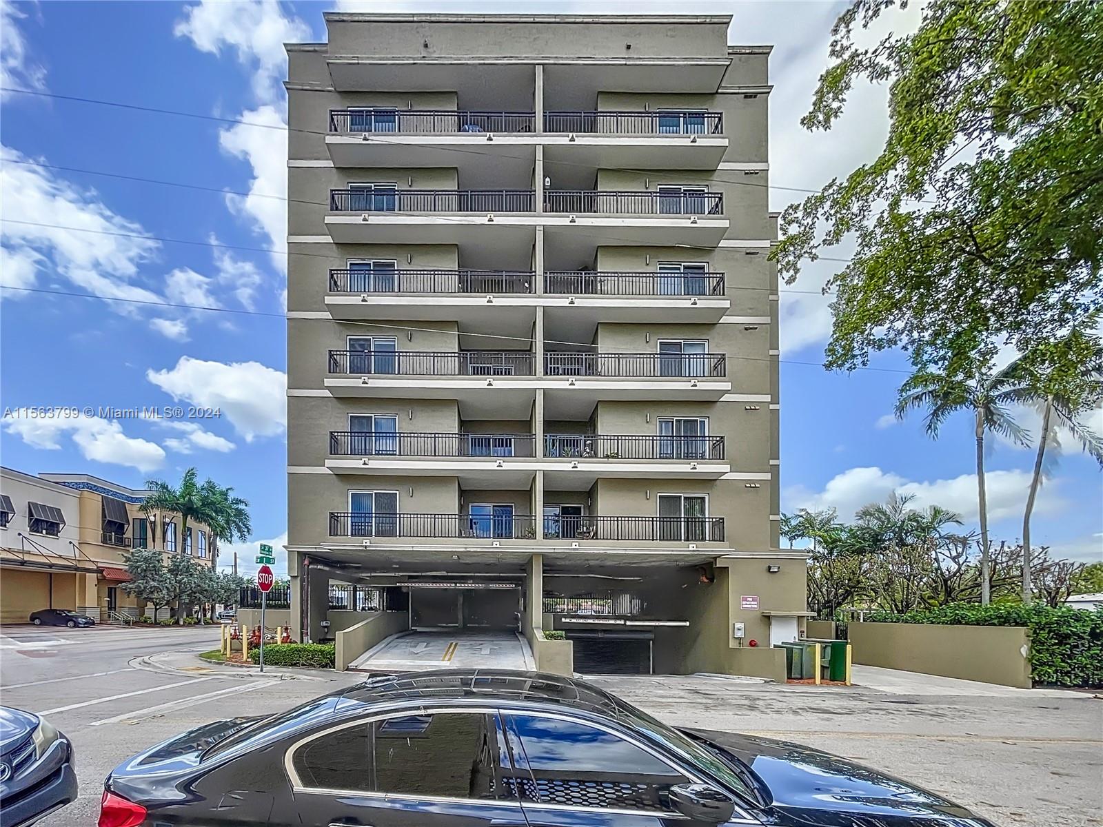 120 South Douglas Road, Unit 302 Miami, FL 33134 - Photo 3 of 28 a view of multiple house with a swimming pool