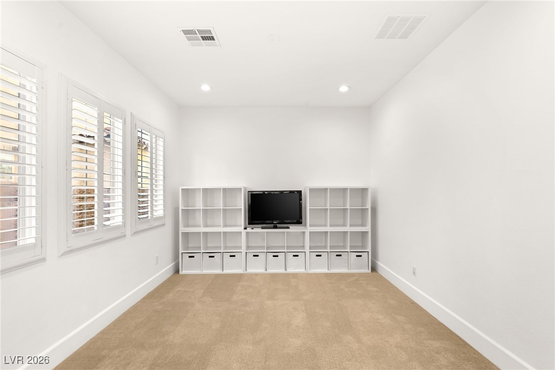 4039 Villa Rafael Drive Las Vegas, NV 89141 - Photo 19 of 45 Unfurnished room with carpet floors and recessed lighting