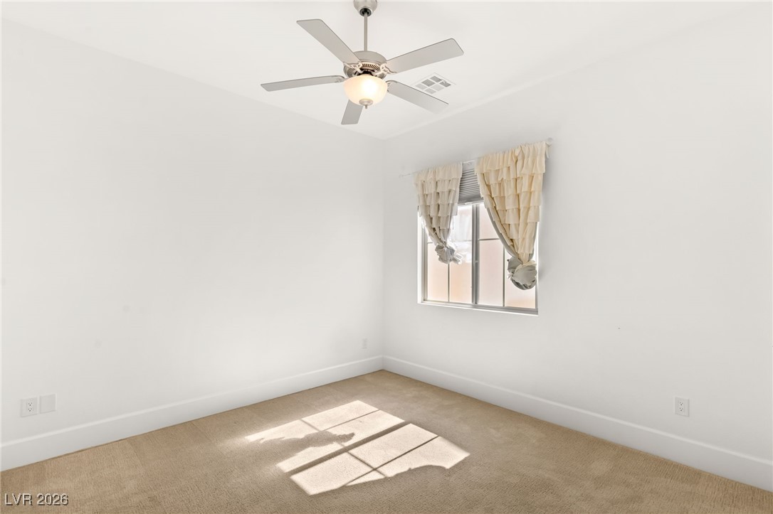 4039 Villa Rafael Drive Las Vegas, NV 89141 - Photo 34 of 45 Empty room featuring carpet and ceiling fan