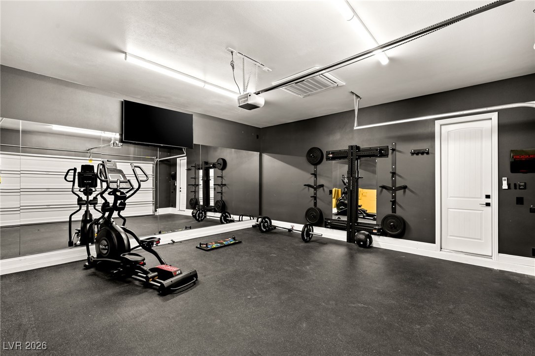 4039 Villa Rafael Drive Las Vegas, NV 89141 - Photo 37 of 45 Workout area featuring a garage