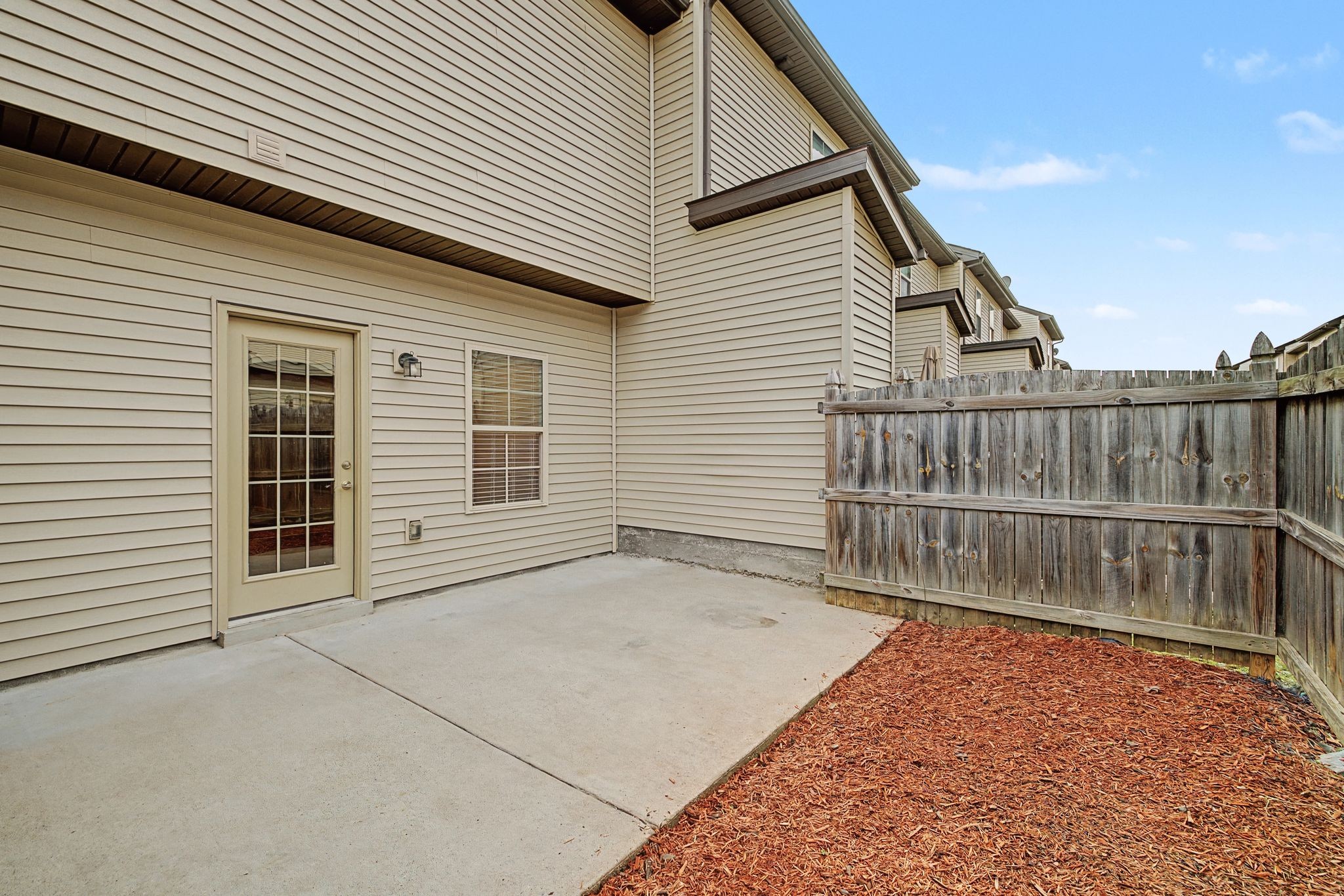 5304 Dan Post Way Murfreesboro, TN 37128 - Photo 29 of 32 a view of backyard with small cabin and wooden fencing