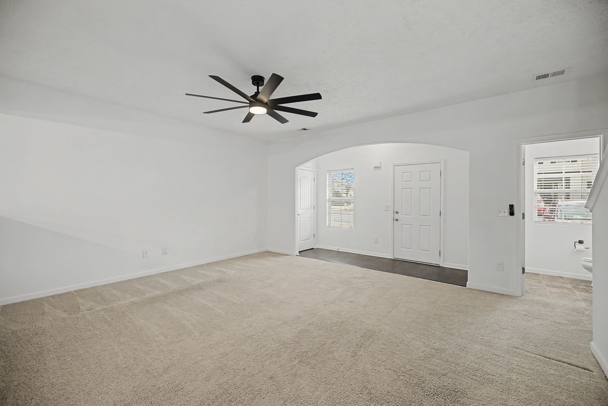 5304 Dan Post Way Murfreesboro, TN 37128 - Photo 7 of 32 an empty room with an empty space and a ceiling fan