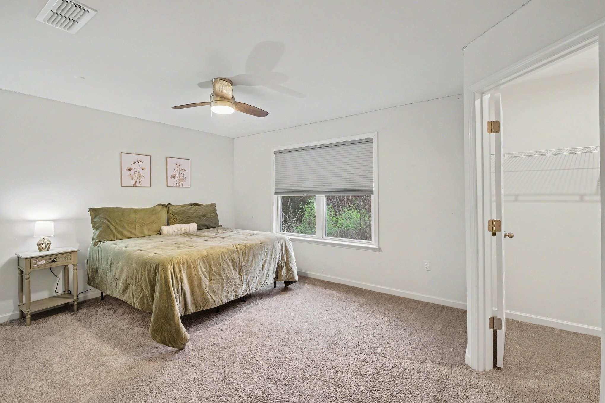 3738 Magpie Lane Murfreesboro, TN 37128 - Photo 24 of 42 a spacious bedroom with a bed and a chandelier