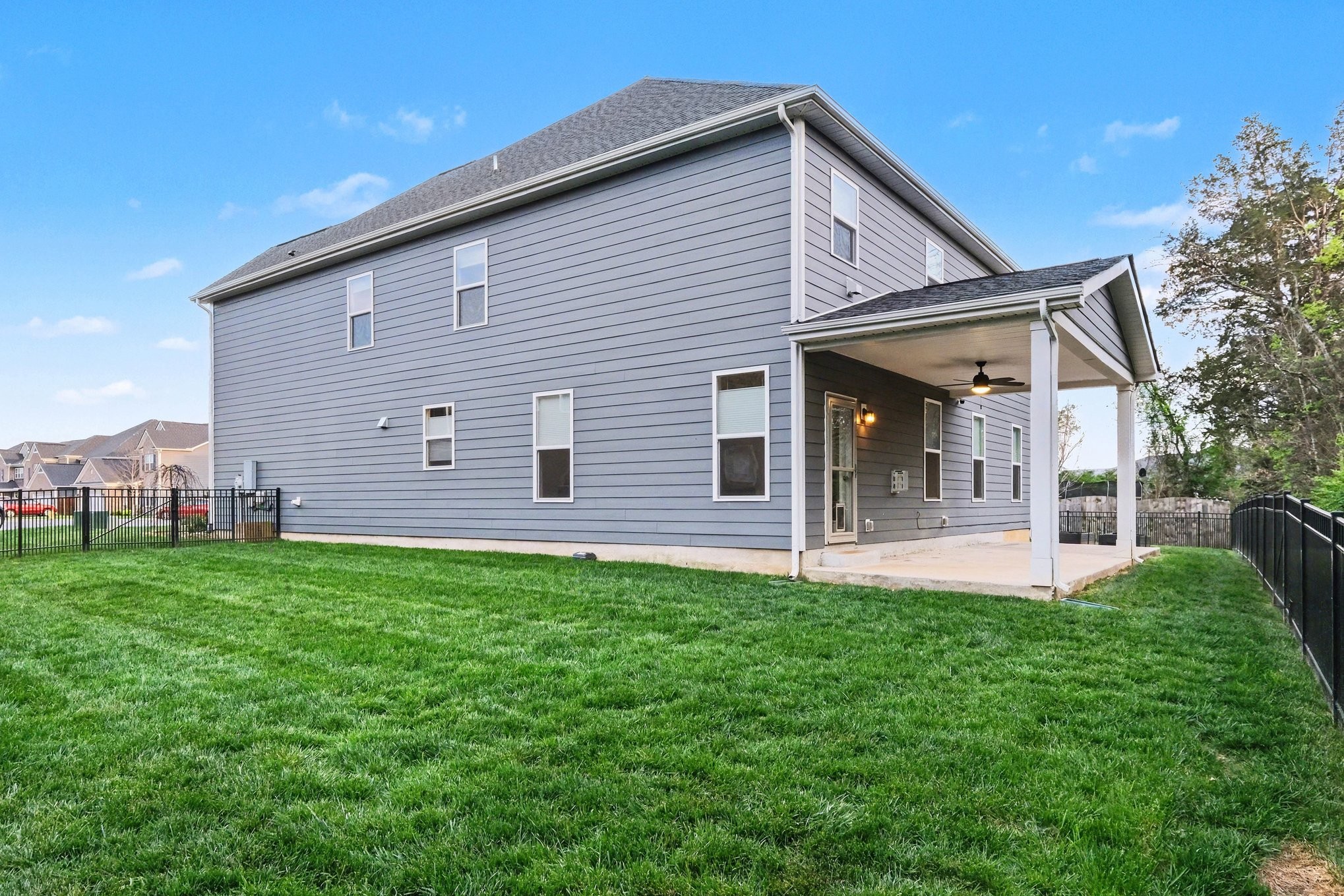 3738 Magpie Lane Murfreesboro, TN 37128 - Photo 37 of 42 a front view of a house with a yard and porch