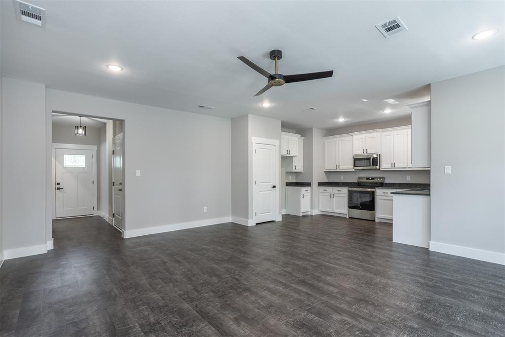 326 West Day Street Denison, TX 75020 - Photo 16 of 27 a view of kitchen with wooden floor