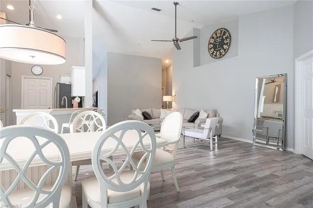 a view of a livingroom with furniture and a table