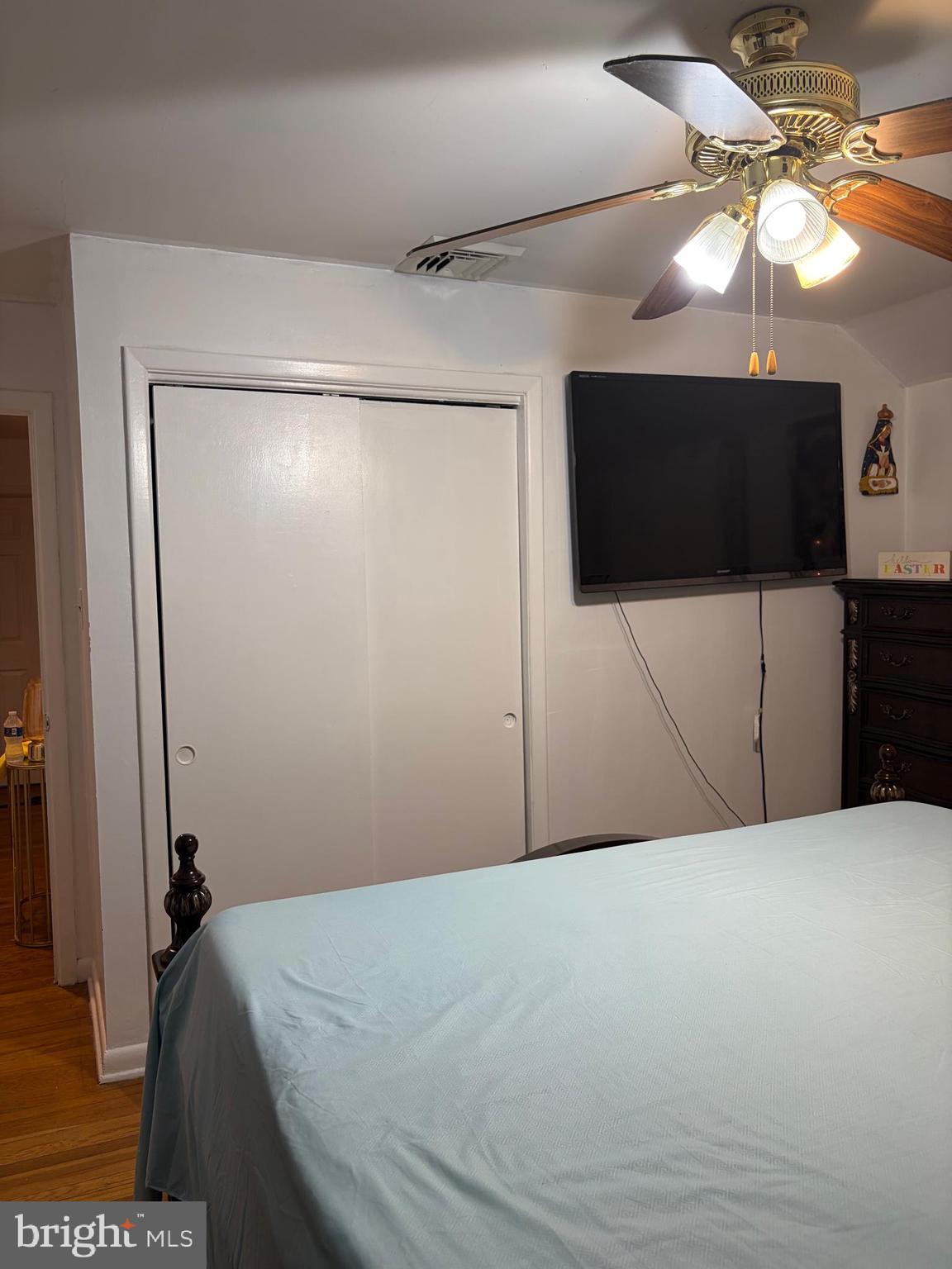 7404 Wyndam Road Pennsauken, NJ 08110 - Photo 23 of 50 a bedroom with a bed and a flat screen tv