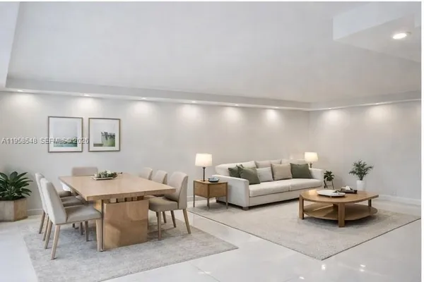 a living room with furniture and a table