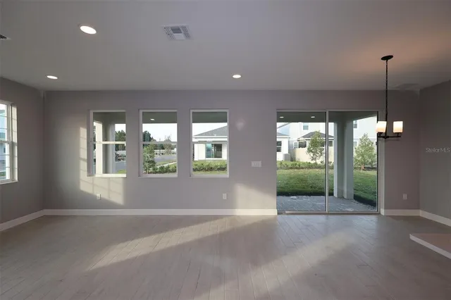 a view of kitchen with wooden floor