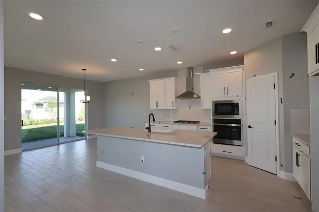 $589,990 | 5244 Teirgarten Street, St. Cloud, FL 34771