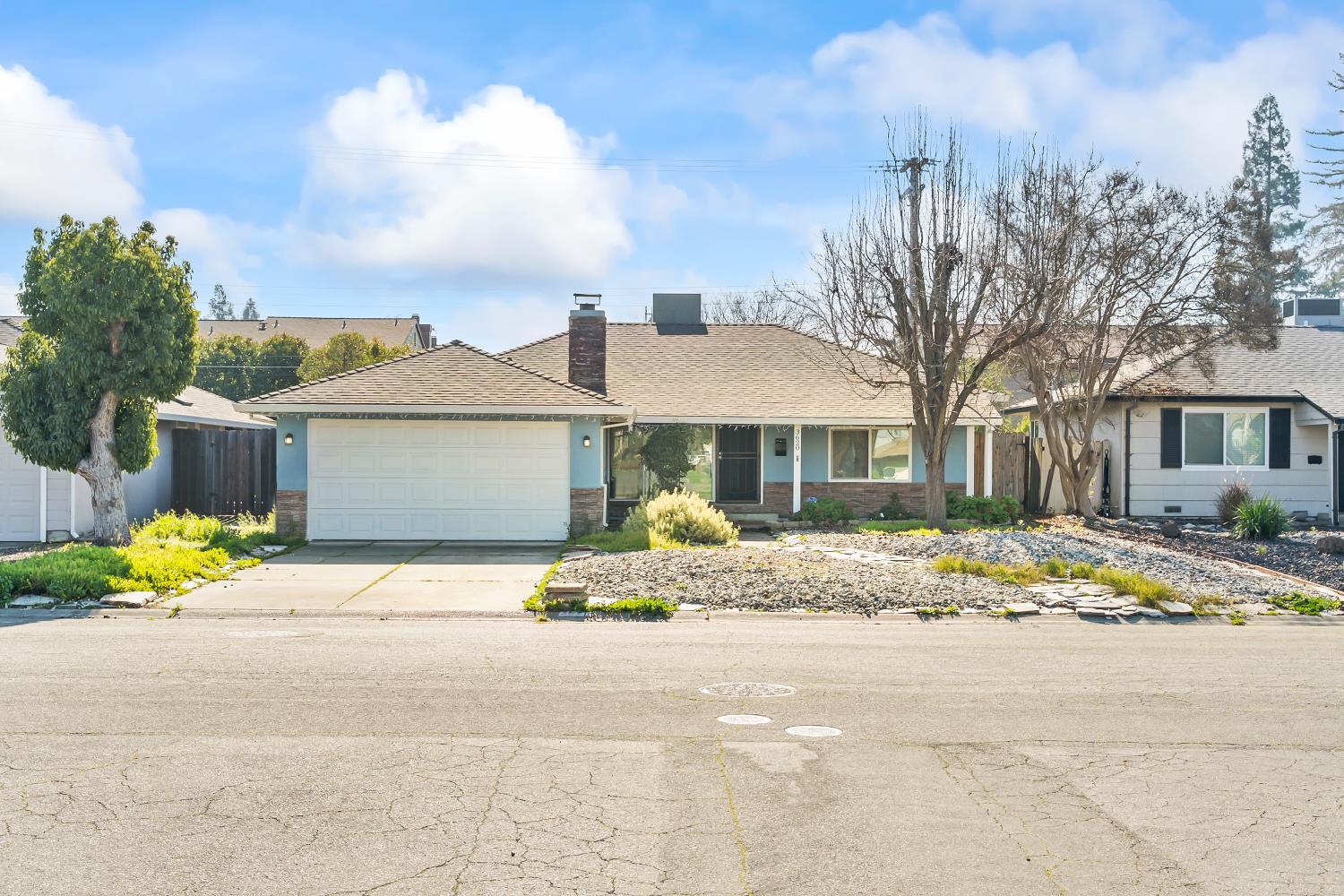 3620 Sean Drive Sacramento, CA 95821 - Photo 1 of 23 a yellow house with trees in front of it